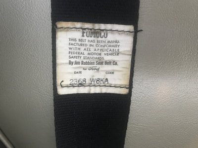 Close-up of a clothing tag with fabric and care instructions.