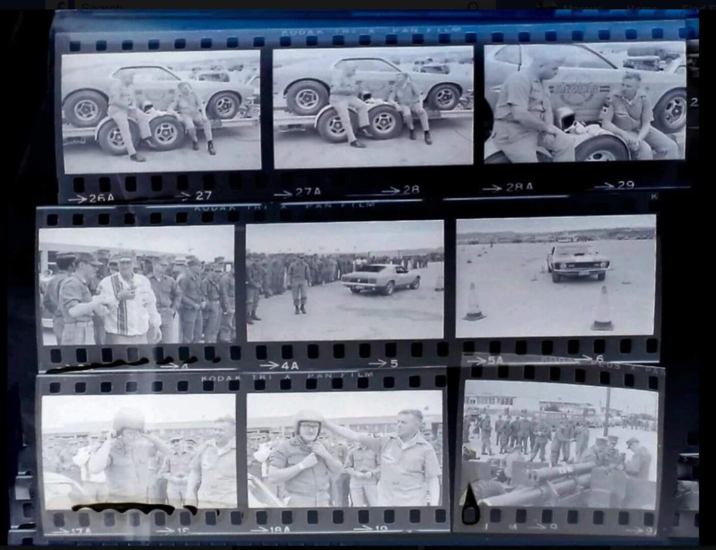 Film strip with vintage car race scenes.