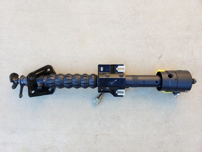 Industrial mechanical component on concrete surface.