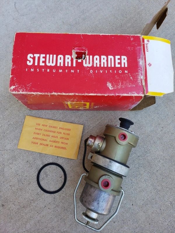 Stewart Warner fuel pump with box.