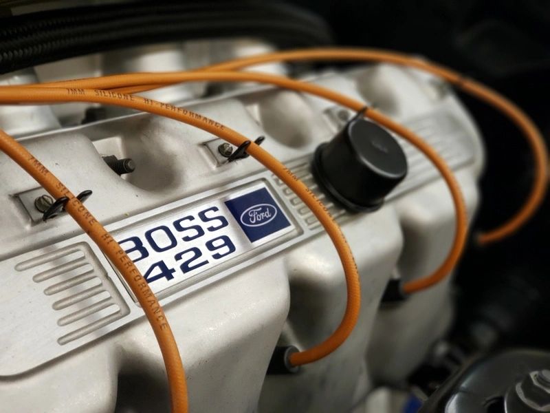 Ford Boss 429 engine with orange cables.