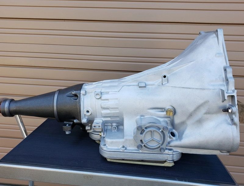 Car transmission on a metal table.