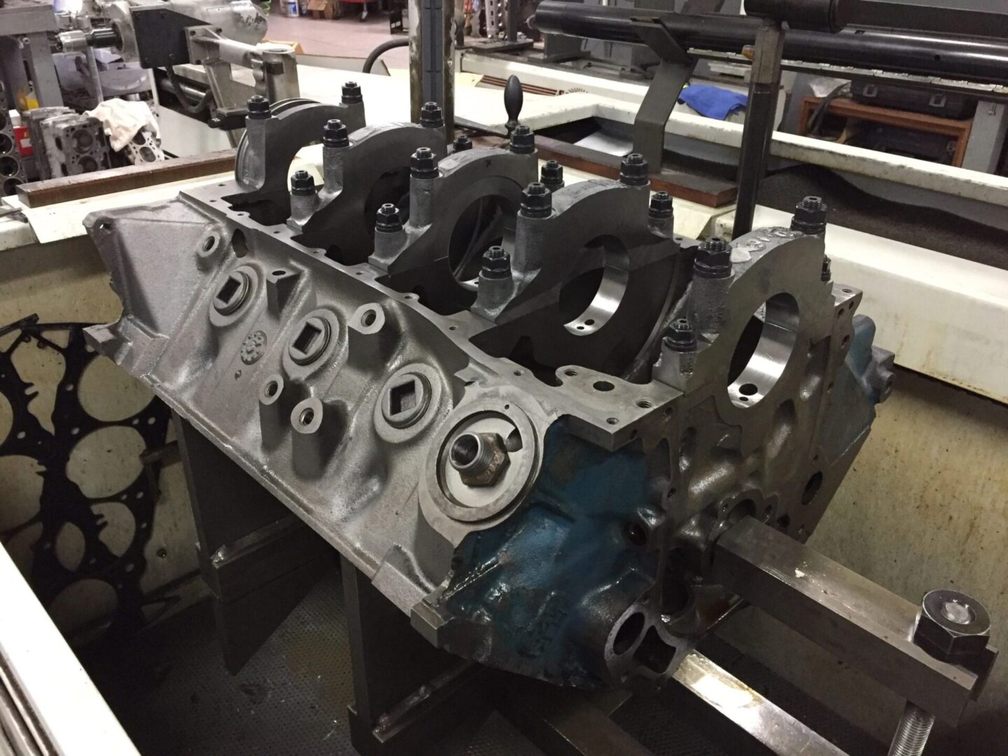 Engine block on a workshop table.