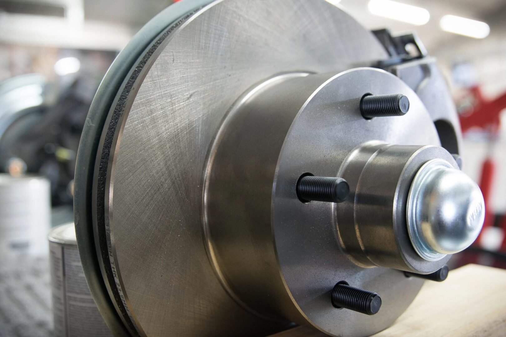 Close-up of car brake disc assembly.