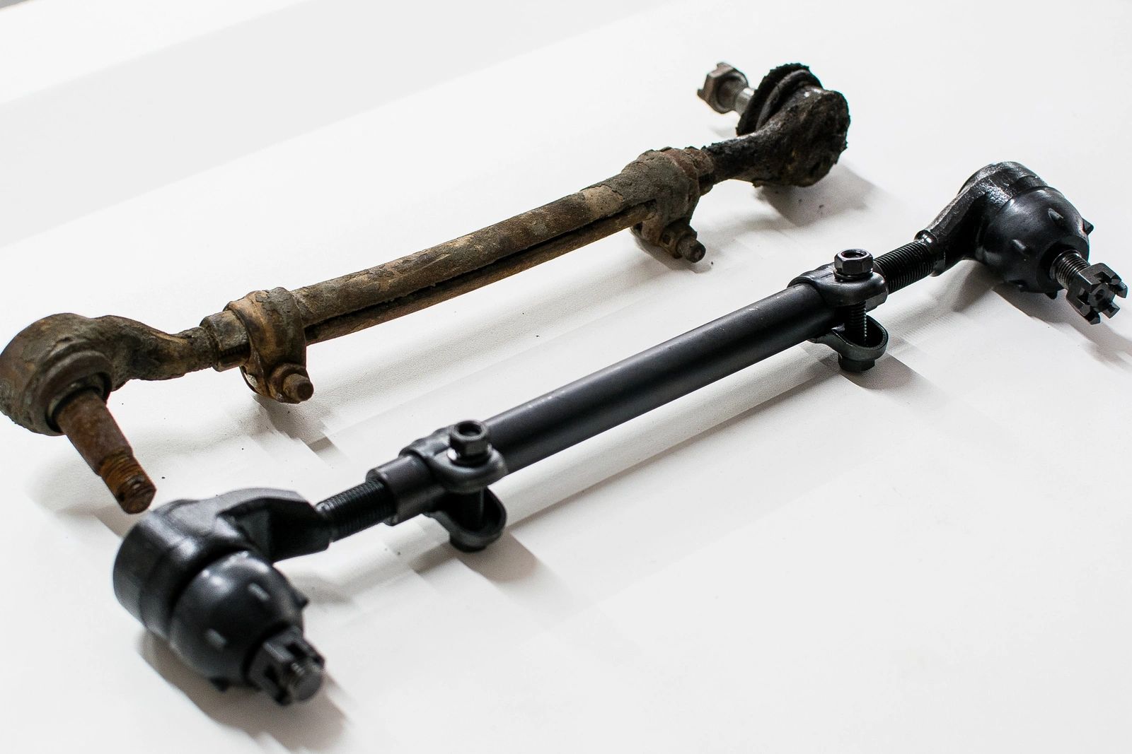 New and old car tie rods comparison.
