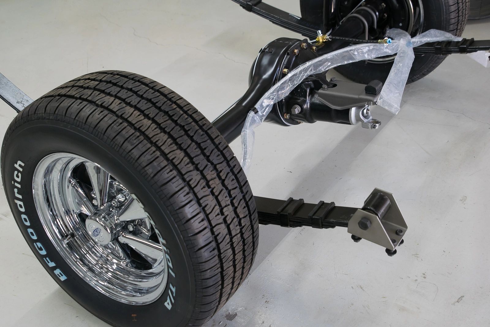 Car wheel and suspension system assembly.