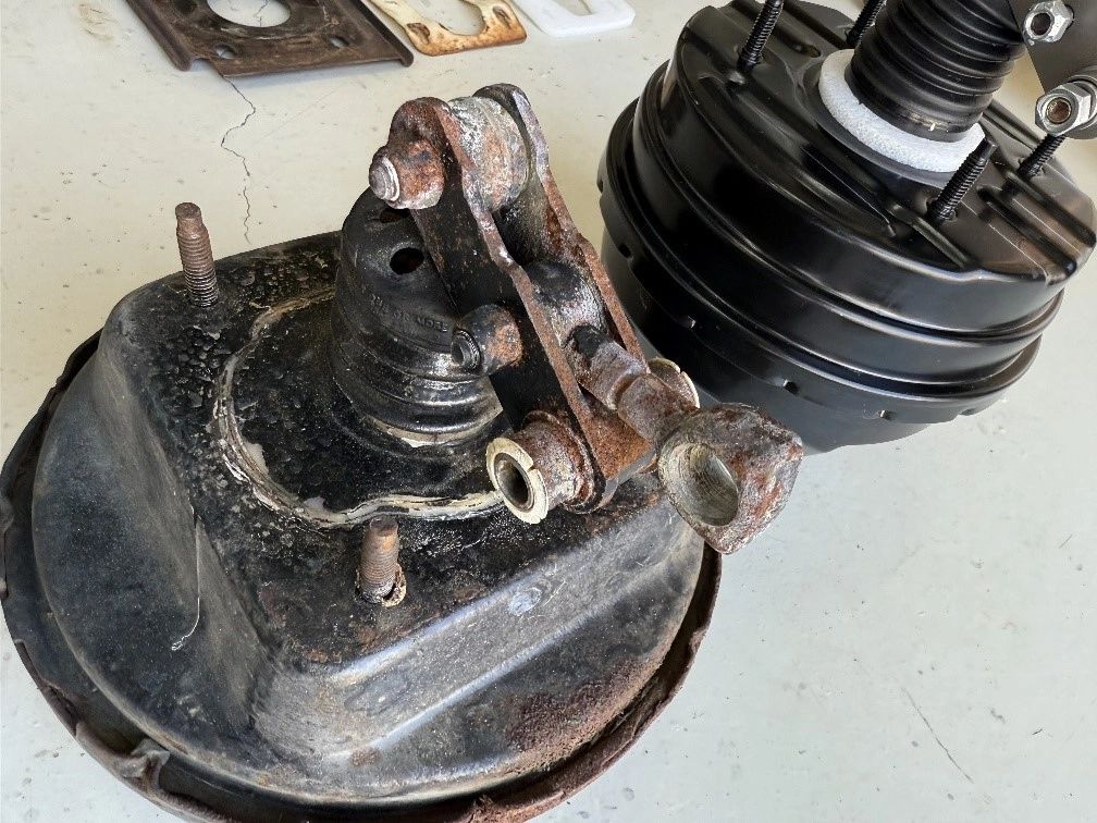 Old and new car brake boosters comparison.