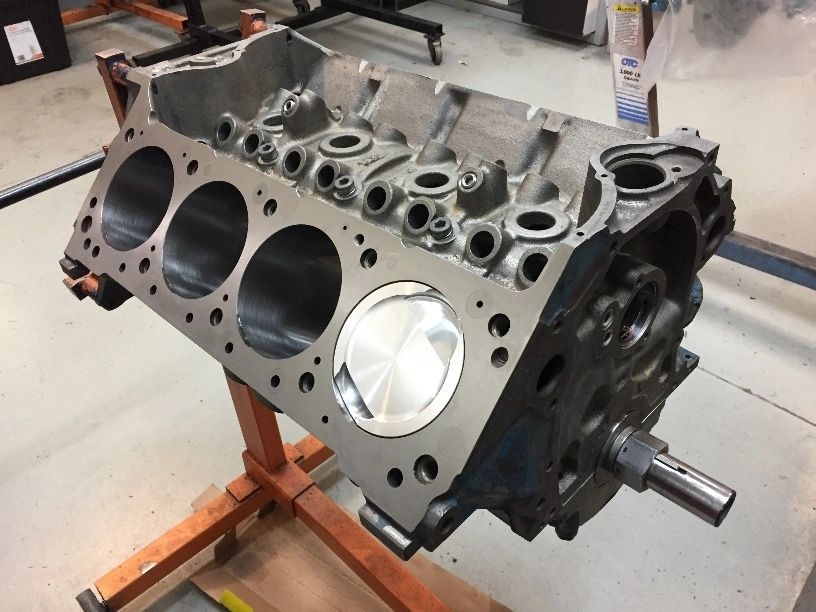 Engine block on a workshop stand.