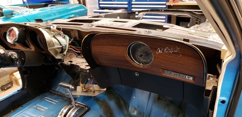 Vintage car interior dashboard under restoration.
