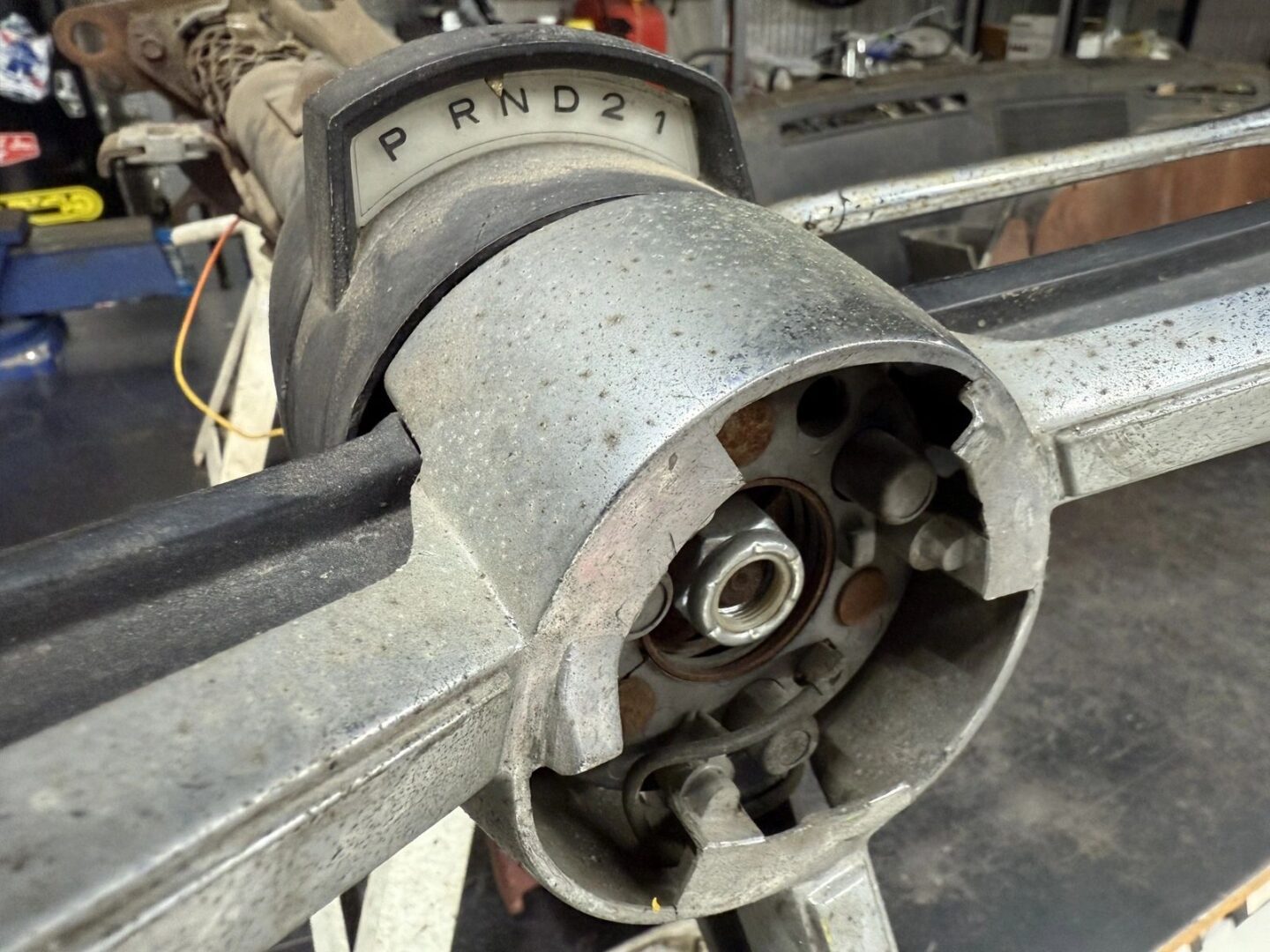 Vehicle transmission gear shift mechanism close-up.