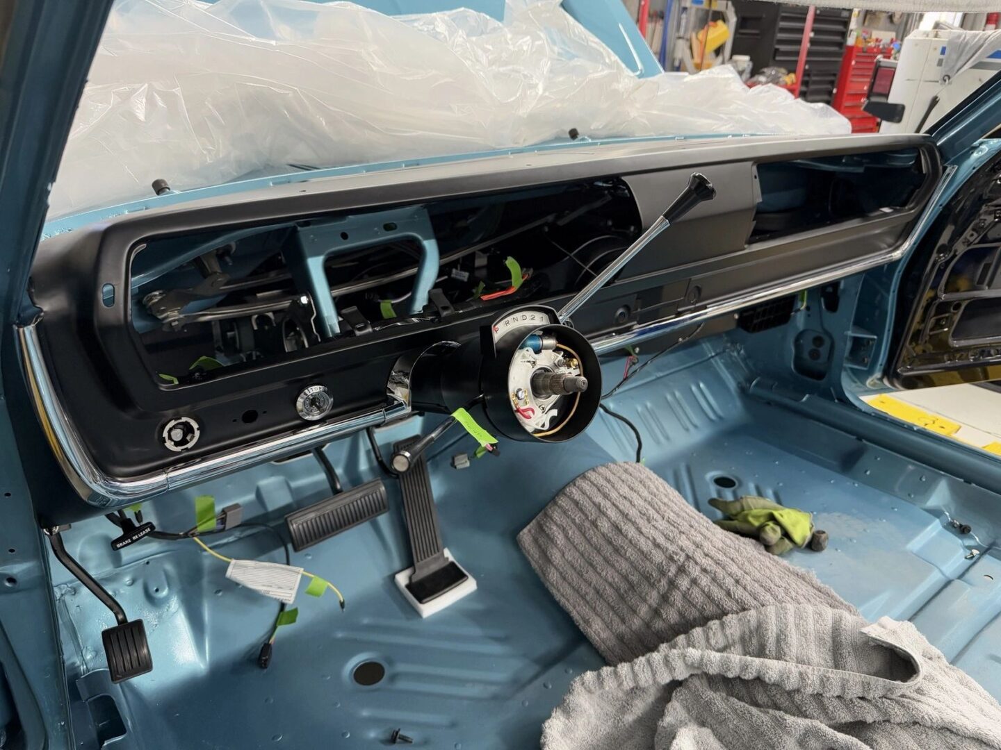 Vintage car dashboard under restoration process.