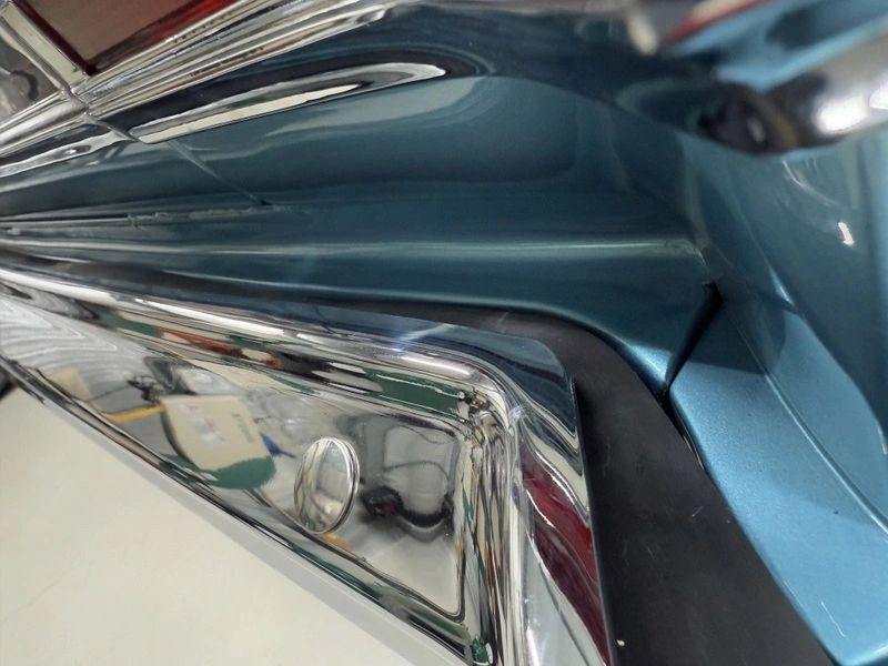 Close-up of vintage car chrome detail.
