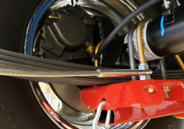 Vehicle wheel with suspension and hook.