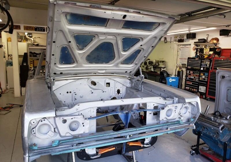 Car body in garage under restoration.