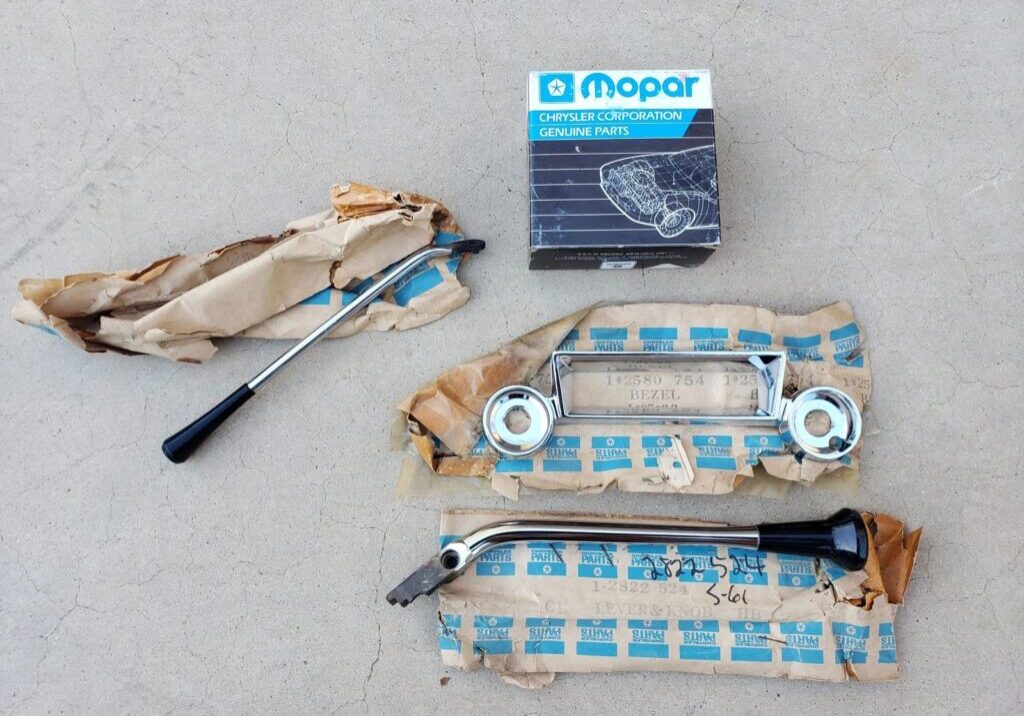 Mopar car parts with packaging materials.