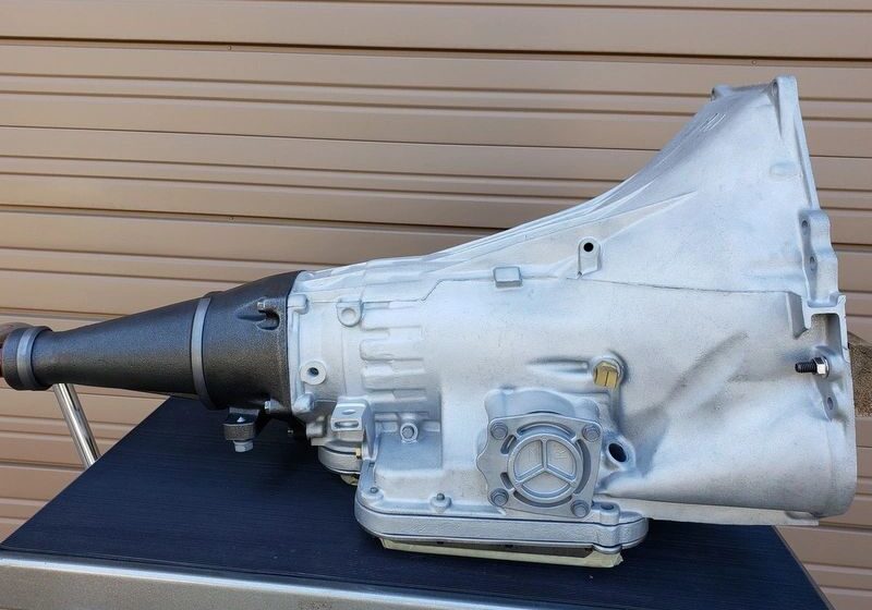 Car transmission on a metal table.