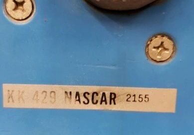 Blue metal panel with NASCAR label.