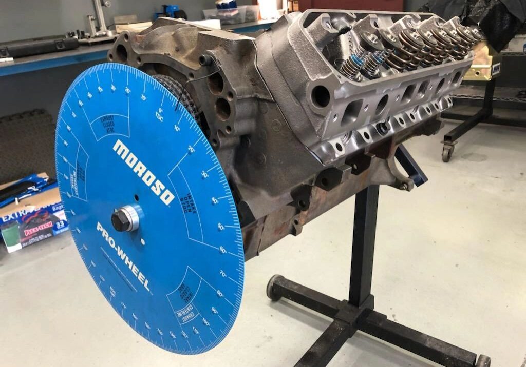 Engine block with blue degree wheel attached.