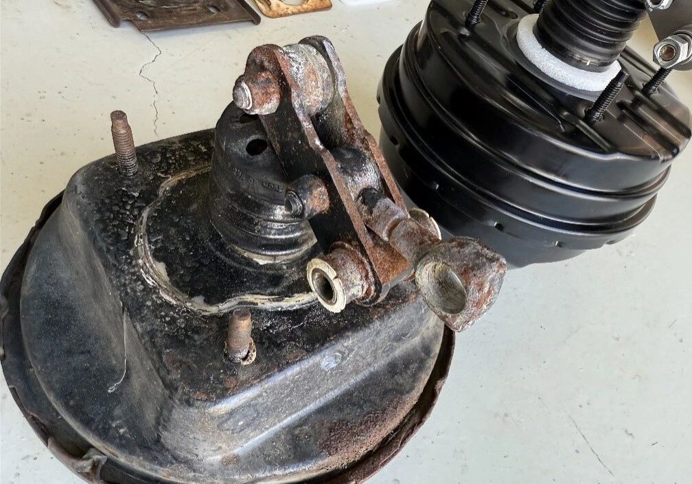 Old and new car brake boosters comparison.