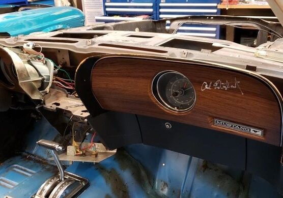 Vintage car interior dashboard under restoration.