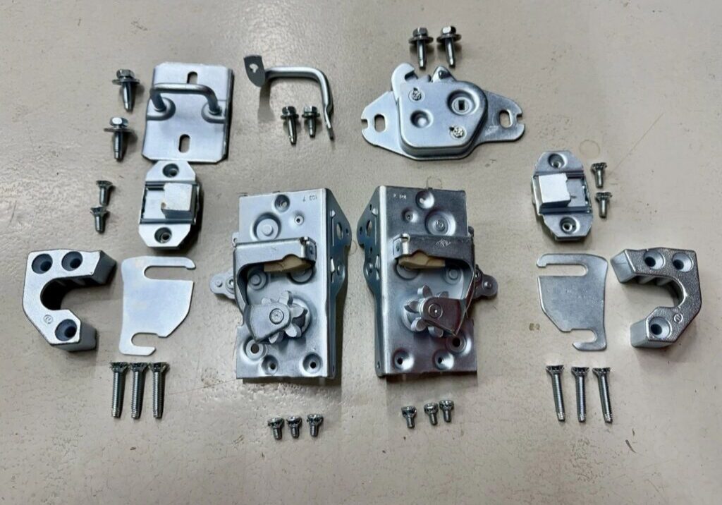 Metallic hardware components and screws on display.