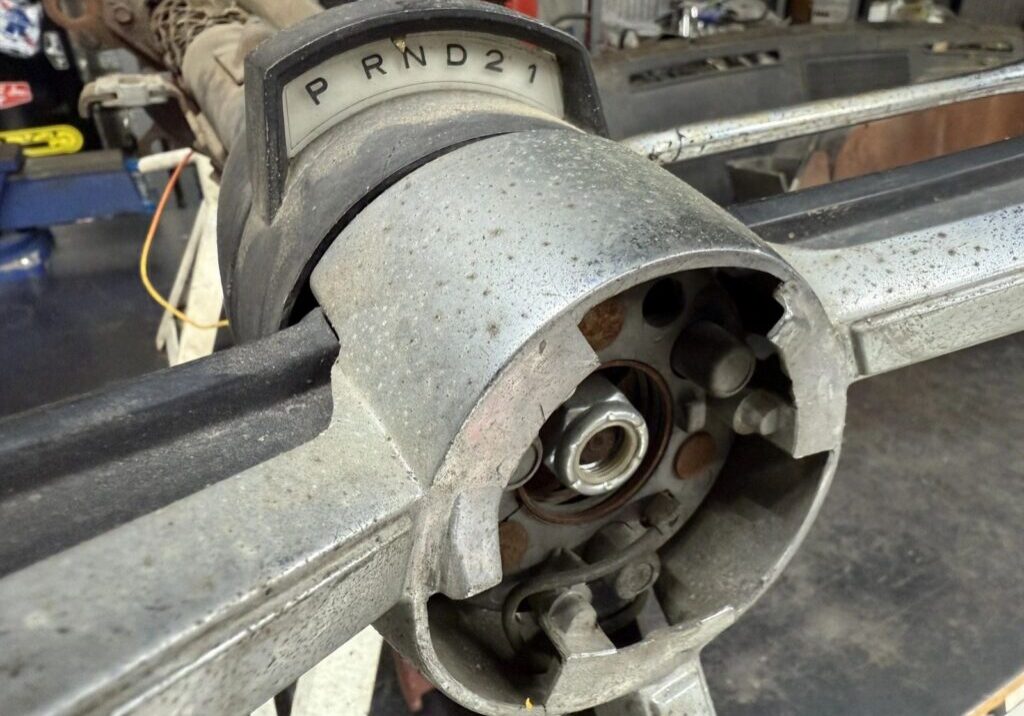 Vehicle transmission gear shift mechanism close-up.